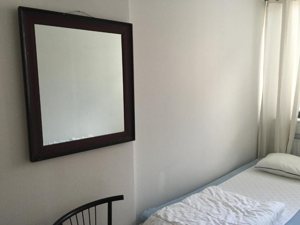 Postel nebo postele na pokoji v ubytování Linné Hostel