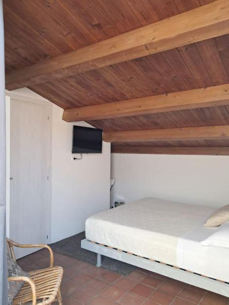 Postel nebo postele na pokoji v ubytování Casa Antioco B&B