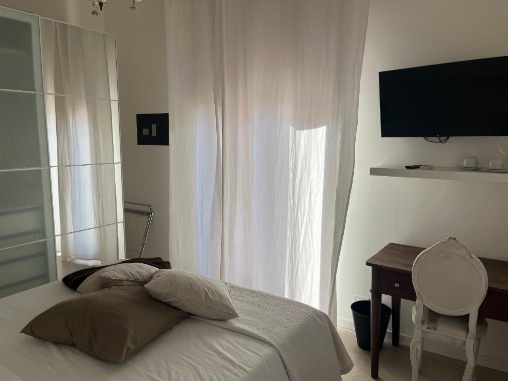 Postel nebo postele na pokoji v ubytování Fleur Blanche