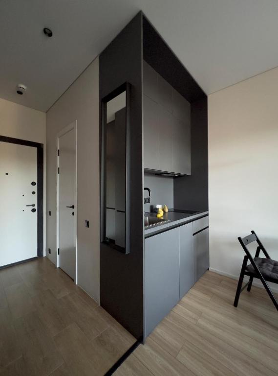 Kuchyň nebo kuchyňský kout v ubytování Dreamside Apartment