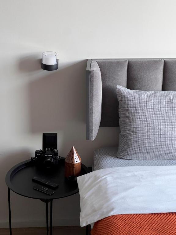 Postel nebo postele na pokoji v ubytování Dreamside Apartment