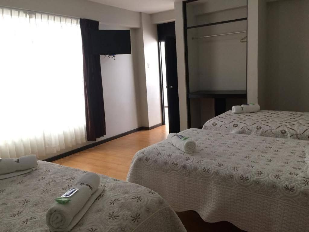 Postel nebo postele na pokoji v ubytování La Lisera Suite Residencial