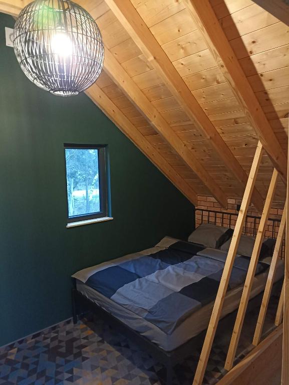 Posteľ alebo postele v izbe v ubytovaní Maraśka Holiday House