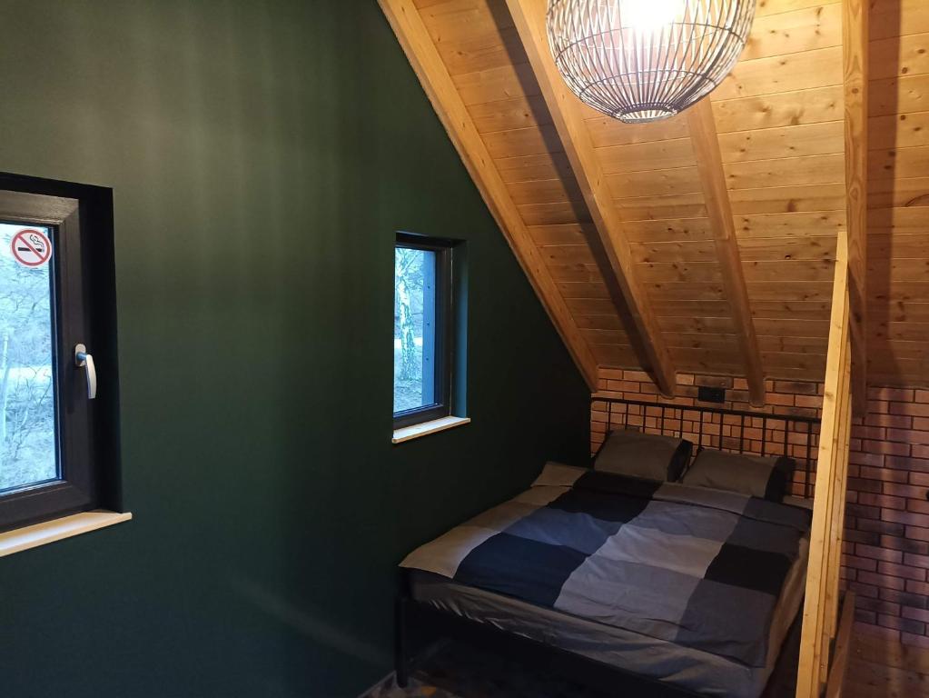 Posteľ alebo postele v izbe v ubytovaní Maraśka Holiday House