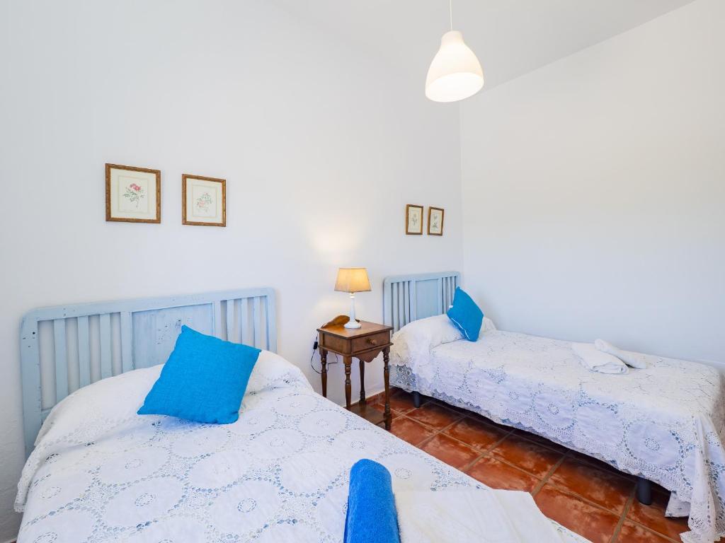 Postel nebo postele na pokoji v ubytování Cubo's Finca La Viña Angulo
