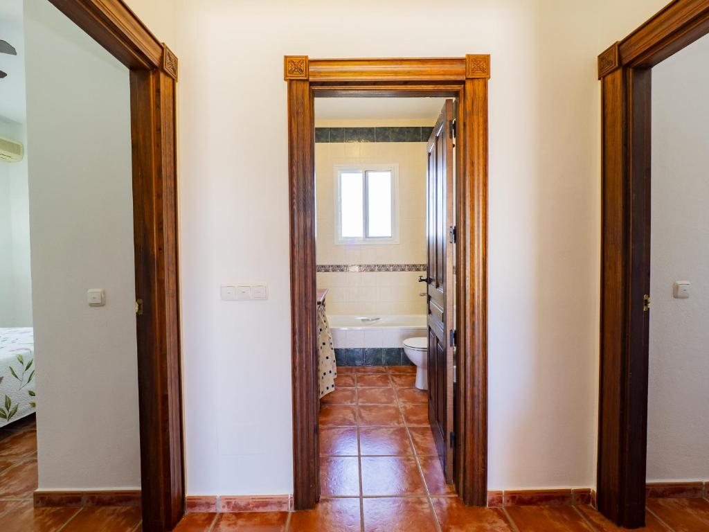 Postel nebo postele na pokoji v ubytování Cubo's Finca La Viña Angulo
