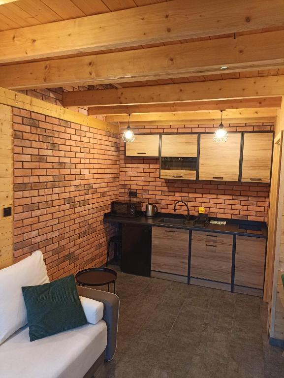 Kuchyňa alebo kuchynka v ubytovaní Maraśka Holiday House