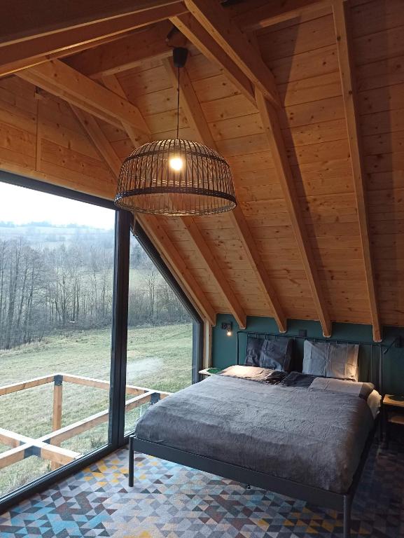Posteľ alebo postele v izbe v ubytovaní Maraśka Holiday House