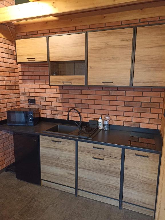 Kuchyňa alebo kuchynka v ubytovaní Maraśka Holiday House