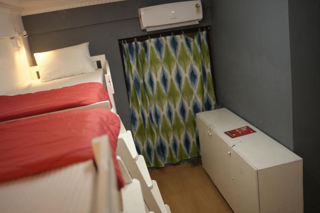 Postel nebo postele na pokoji v ubytování Xhostel hostel