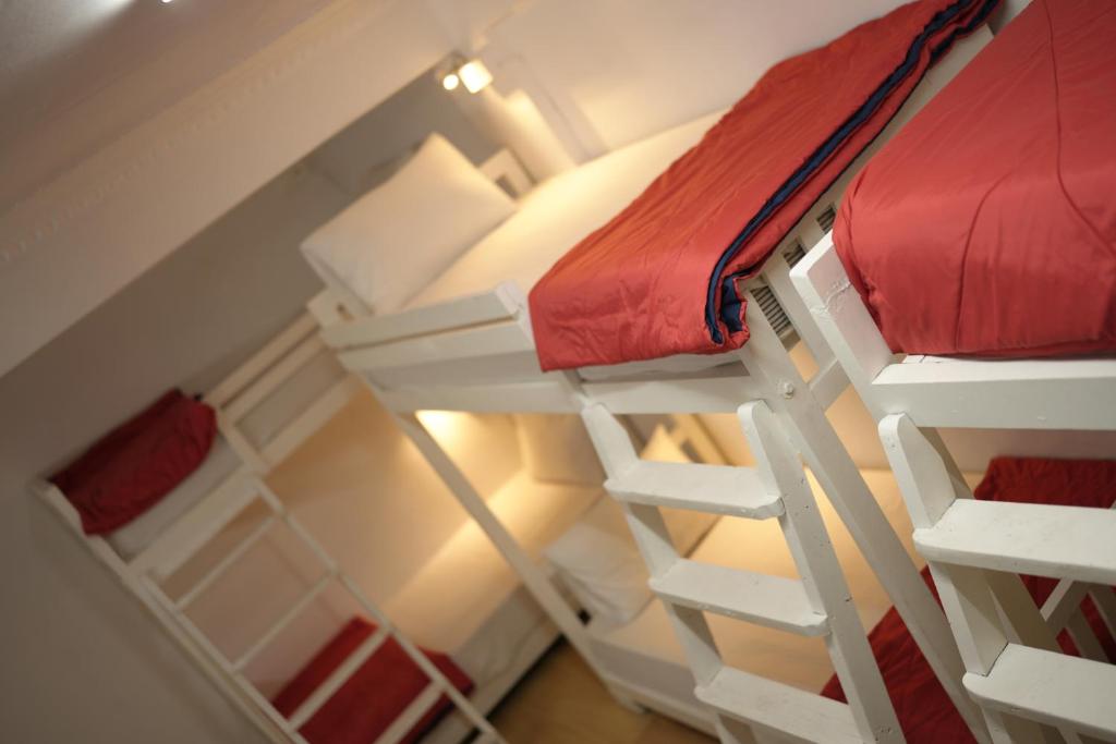 Postel nebo postele na pokoji v ubytování Xhostel hostel