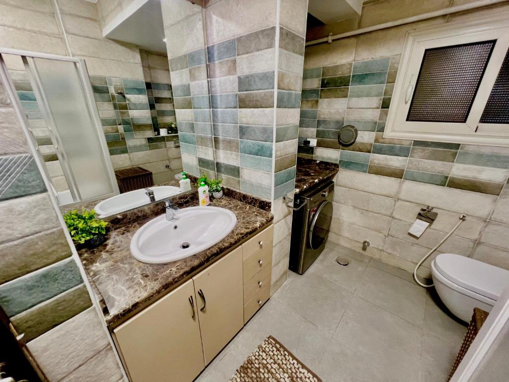 Koupelna v ubytování Airport Edge Suite