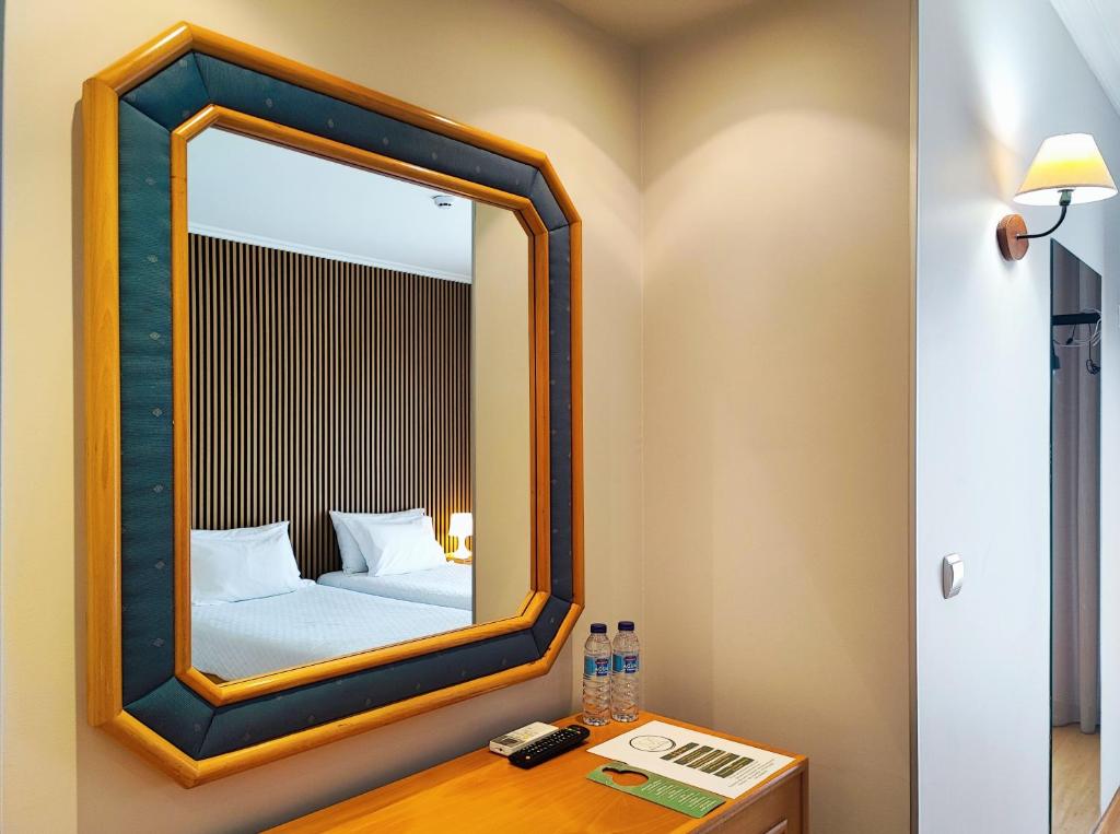 Postel nebo postele na pokoji v ubytování Hotel Miracastro