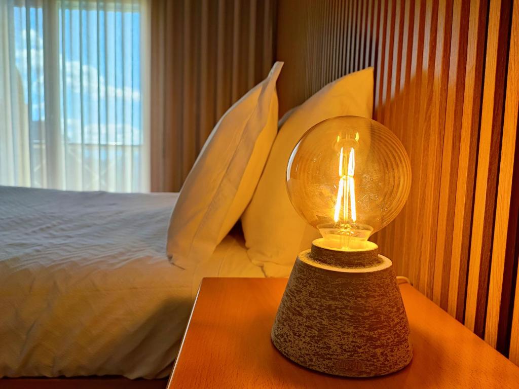 Postel nebo postele na pokoji v ubytování Hotel Miracastro