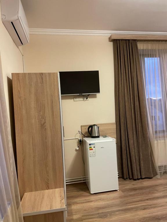 Kuchyň nebo kuchyňský kout v ubytování DECCA Hotel