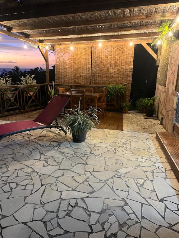 Patio nebo venkovní prostory v ubytování Villa Schœlcher, vue sur mer a 3 min à pied, avec piscine