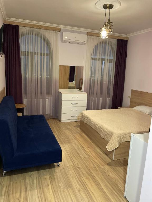 Postel nebo postele na pokoji v ubytování DECCA Hotel