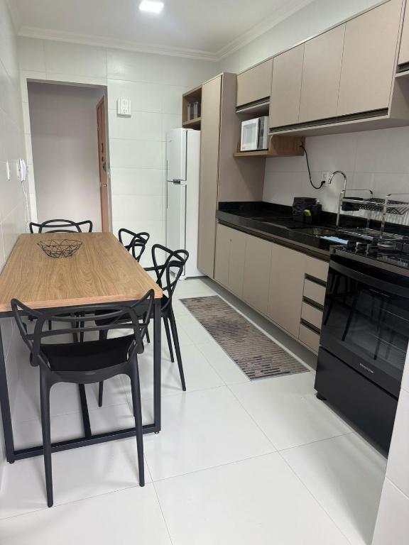 Kuchyň nebo kuchyňský kout v ubytování Apartamento novinho em Belém