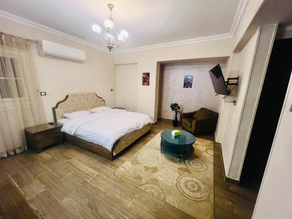 Postel nebo postele na pokoji v ubytování Cairo Airport Inn