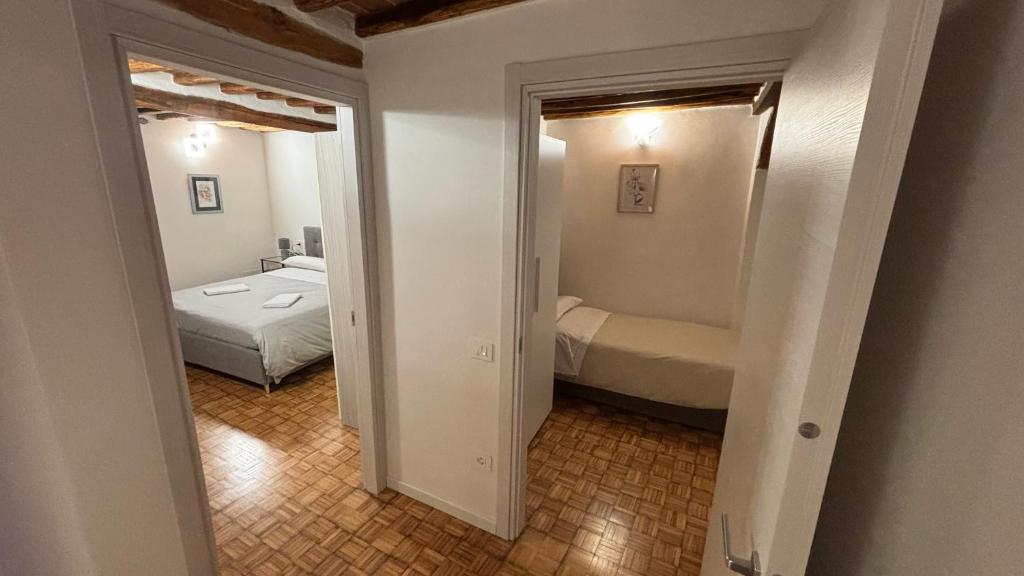 Katil atau katil-katil dalam bilik di Residenza SOTTO IL CAMPANILE