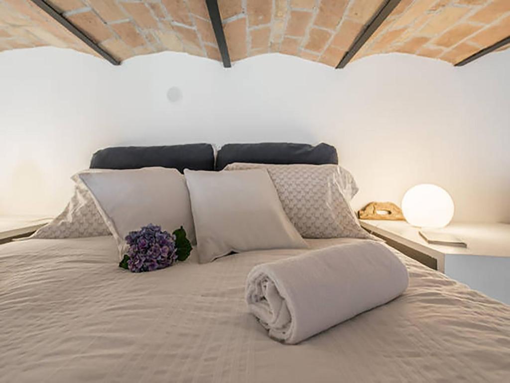 Posteľ alebo postele v izbe v ubytovaní Over The Tiber Loft