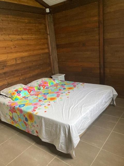 Postel nebo postele na pokoji v ubytování Bungalow ROUGE