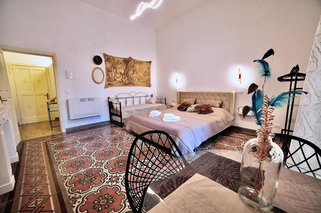 Postel nebo postele na pokoji v ubytování La Corte rooms