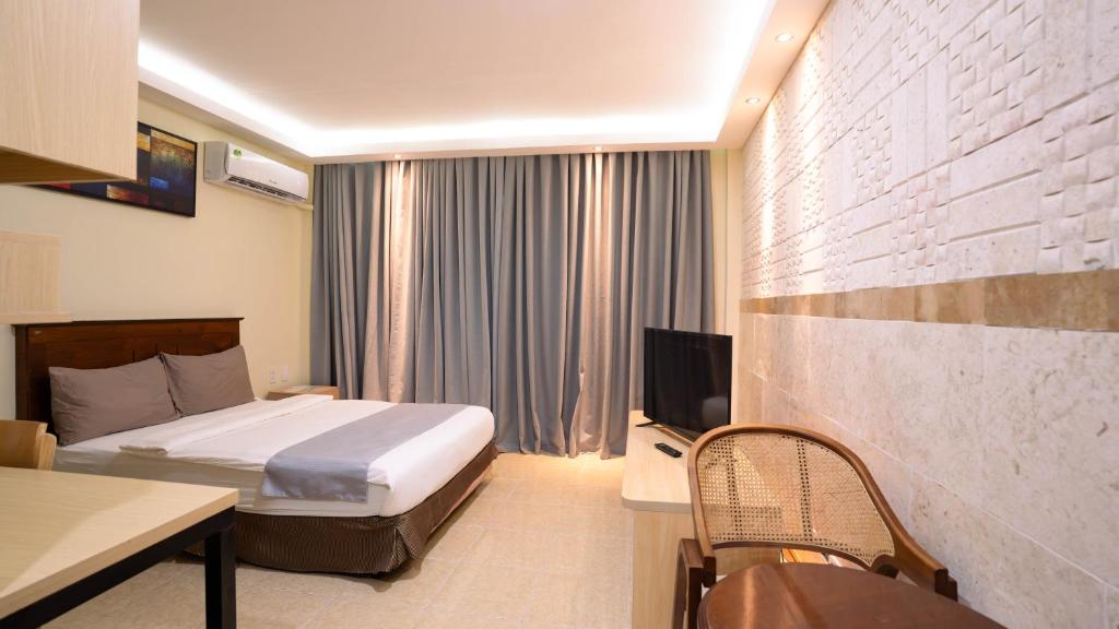 TV a/nebo společenská místnost v ubytování Very Good Hotel