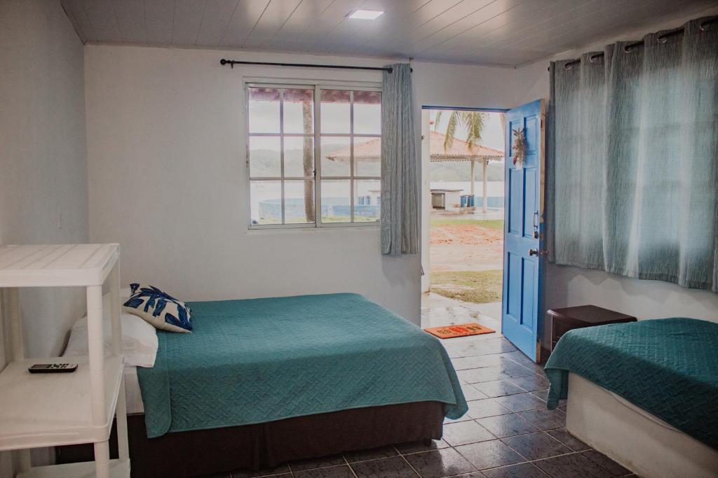 Postel nebo postele na pokoji v ubytování La Posada del Buzo