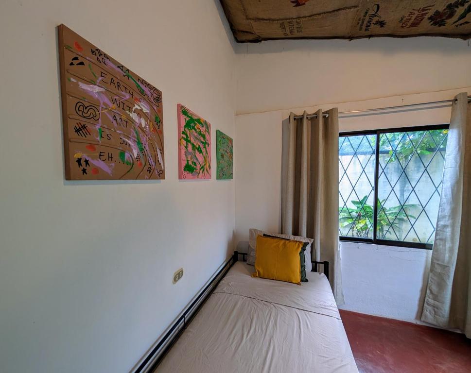 Postel nebo postele na pokoji v ubytování Don Jiménez Guesthouse