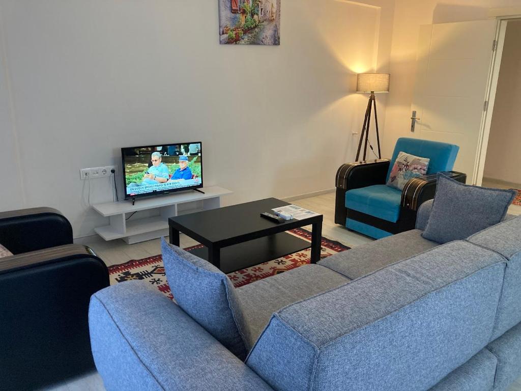 TV a/nebo společenská místnost v ubytování Dalaman Pansiyon & Family rooms
