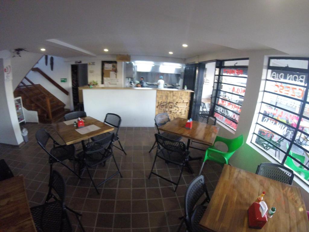 Kuchyň nebo kuchyňský kout v ubytování Hostal de la 57