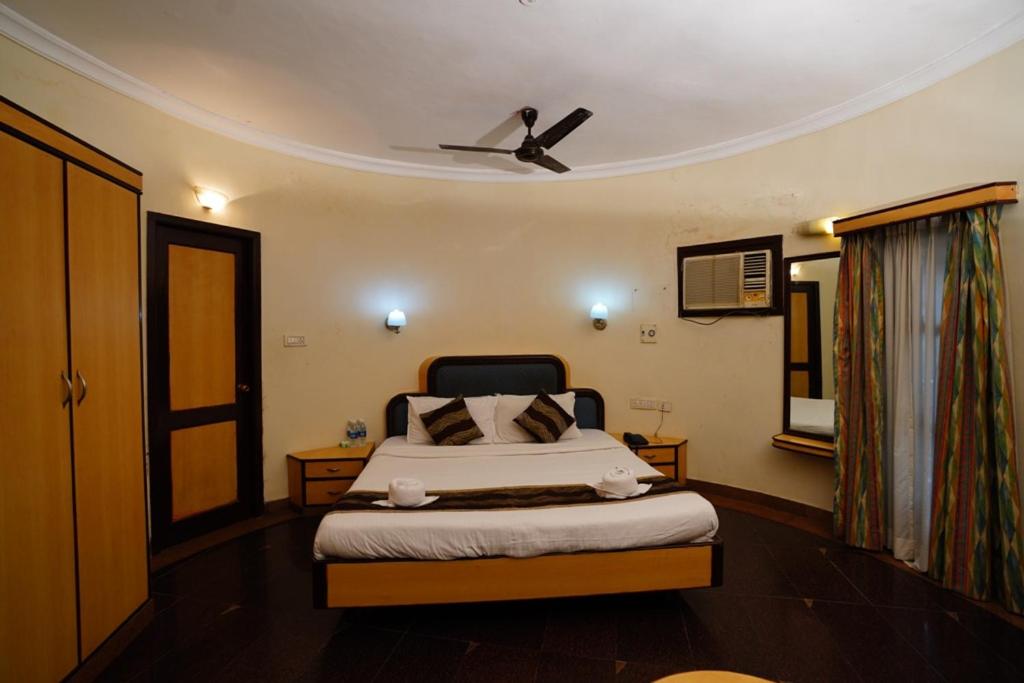 Postel nebo postele na pokoji v ubytování Greencoconutresort