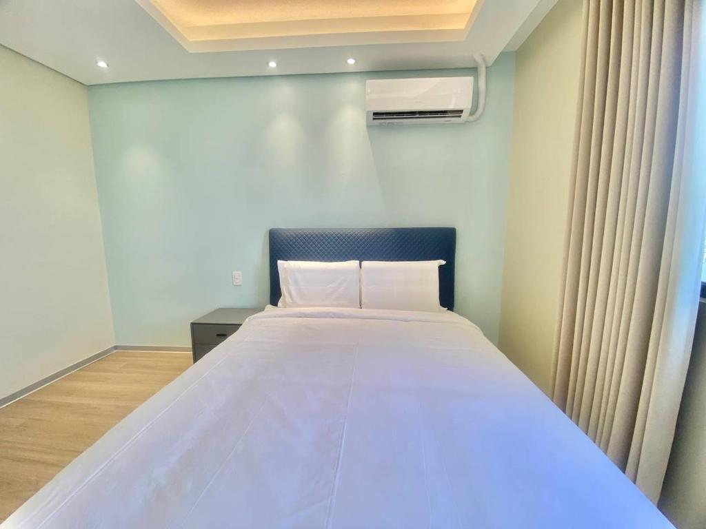 Voodi või voodid majutusasutuse City Center Executive Hotel-Near Manila Airport and PITX toas