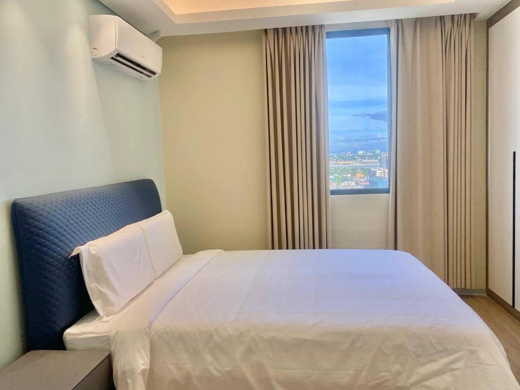 Voodi või voodid majutusasutuse City Center Executive Hotel-Near Manila Airport and PITX toas