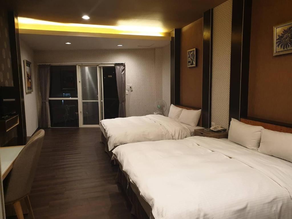 Postel nebo postele na pokoji v ubytování Ci Meng Rou Resort Villa