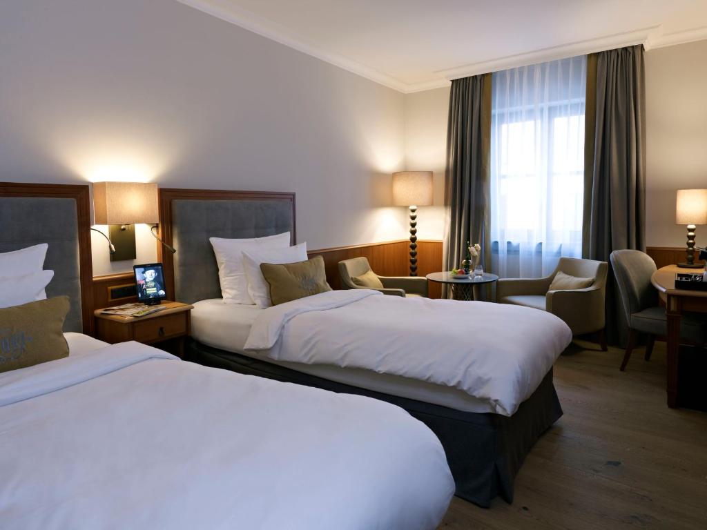 Postel nebo postele na pokoji v ubytování Platzl Hotel - Superior