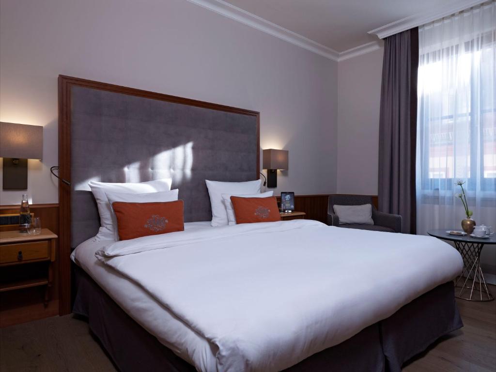 Postel nebo postele na pokoji v ubytování Platzl Hotel - Superior