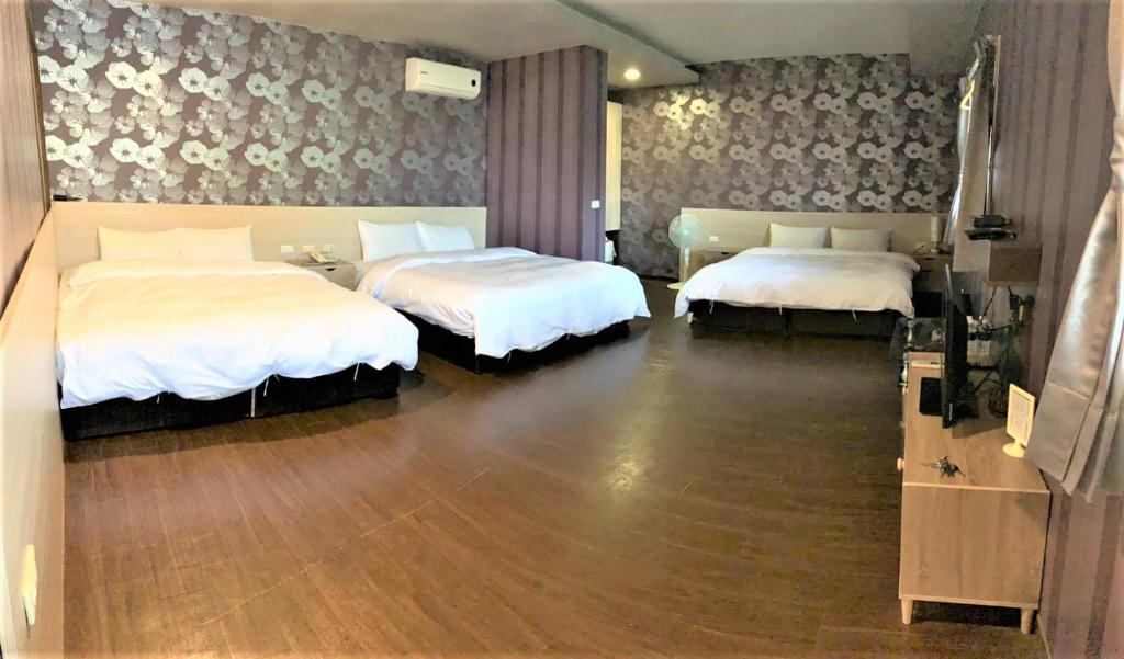Postel nebo postele na pokoji v ubytování Ci Meng Rou Resort Villa