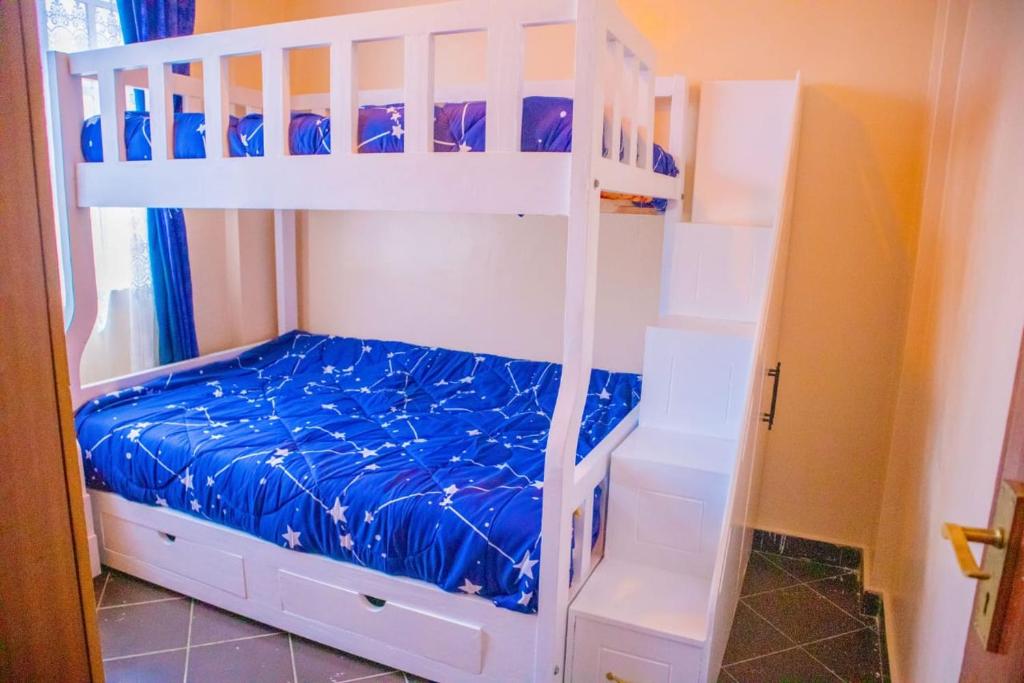 Llit o llits en una habitació de Peshlocs B&B