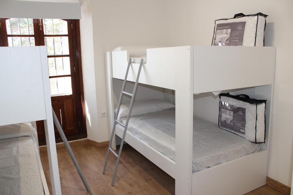 Postel nebo postele na pokoji v ubytování Pórtico del Azahín