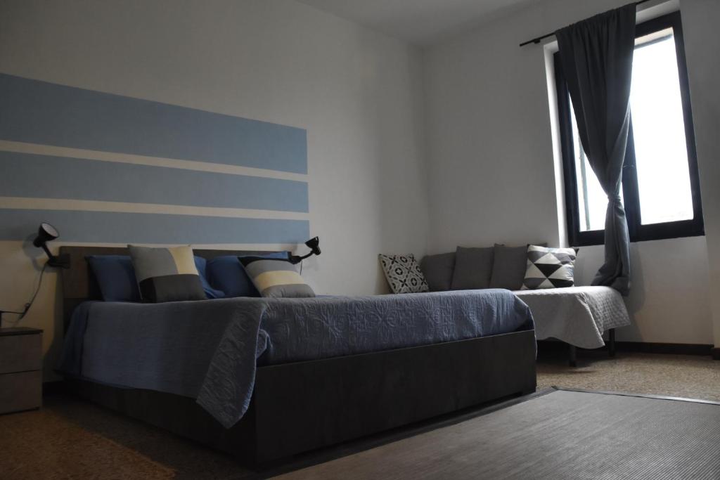 Postel nebo postele na pokoji v ubytování Donpedro's home