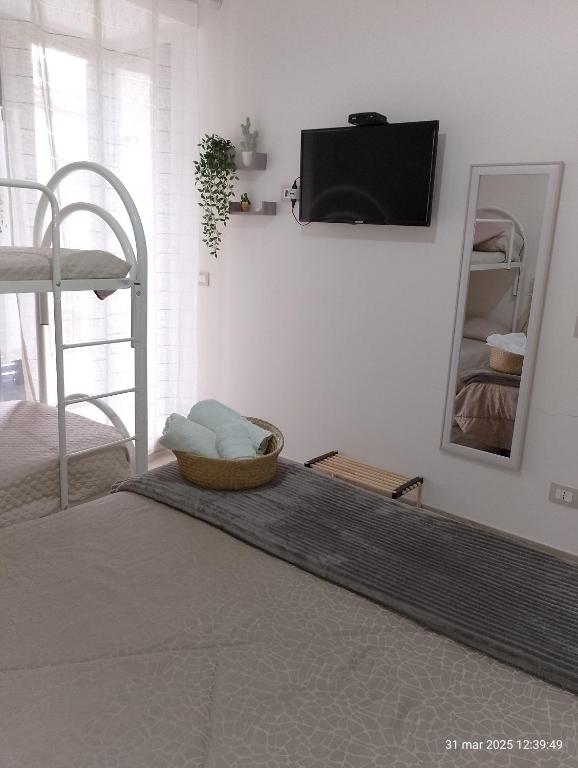 A bed or beds in a room at L'antico borgo