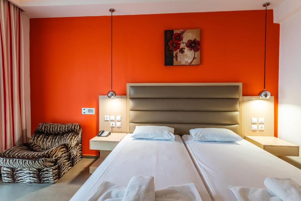 Postel nebo postele na pokoji v ubytování Pantheon Hotel