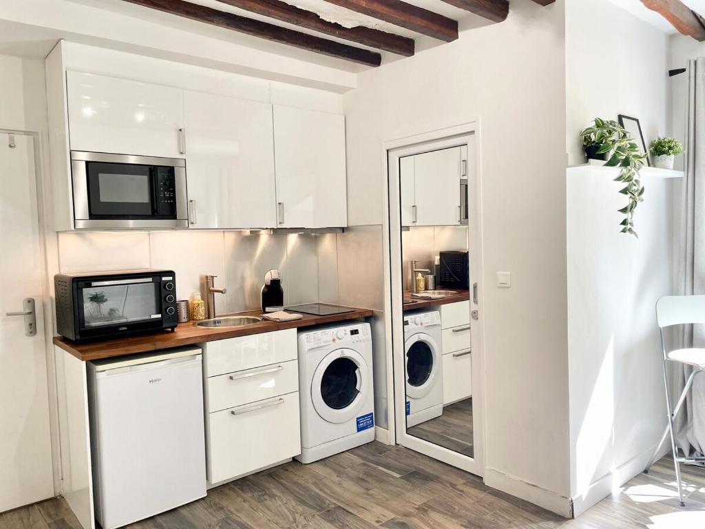 Photo de la galerie de l'établissement Cosy flat Bastille & Marais - Wifi fibre & Netflix, à Paris