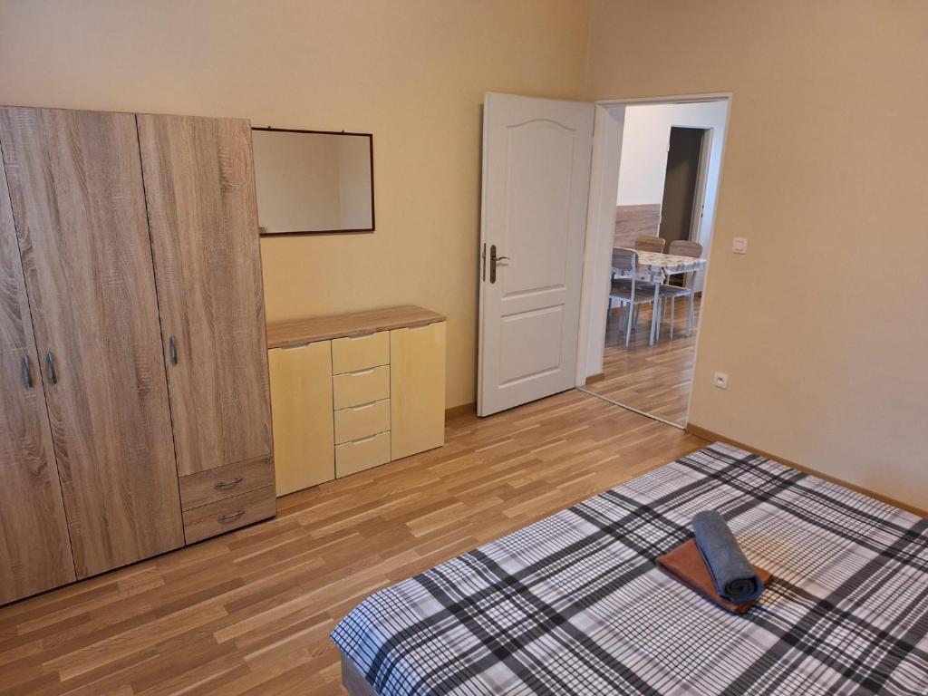 Postel nebo postele na pokoji v ubytování Star Apartments