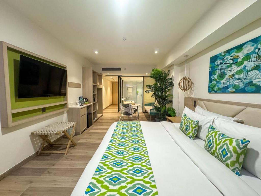 Postel nebo postele na pokoji v ubytování Lime Resort El Nido