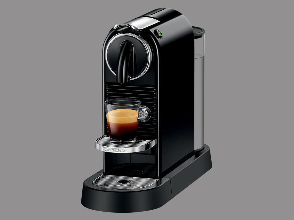 a coffee maker with a glass of coffee at Villa Olivija-direkt am Strand! in Stara Novalja