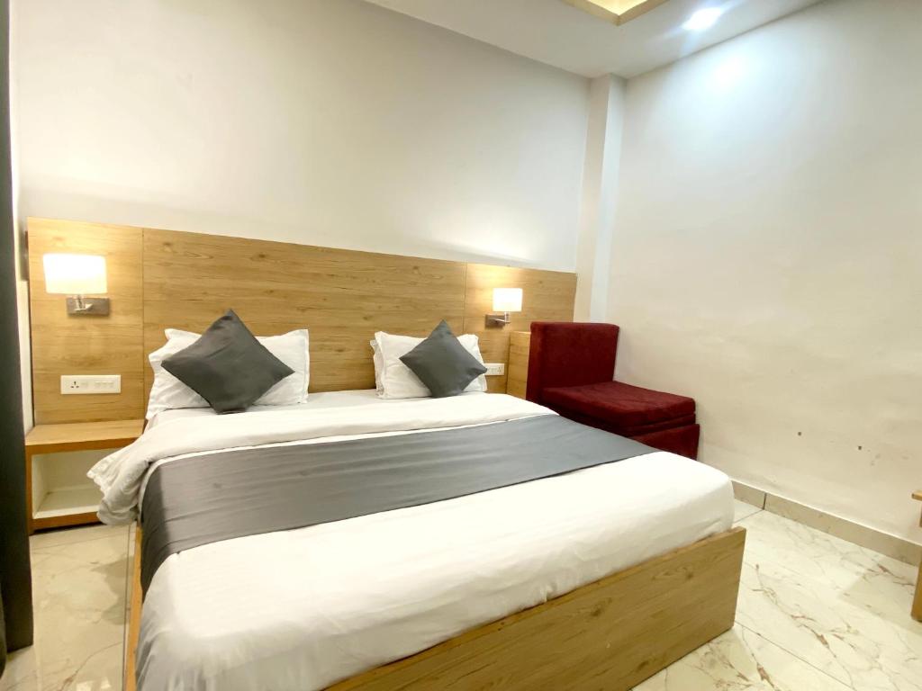 Postelja oz. postelje v sobi nastanitve Sonu Guesthouse & Hostel, Rishikesh
