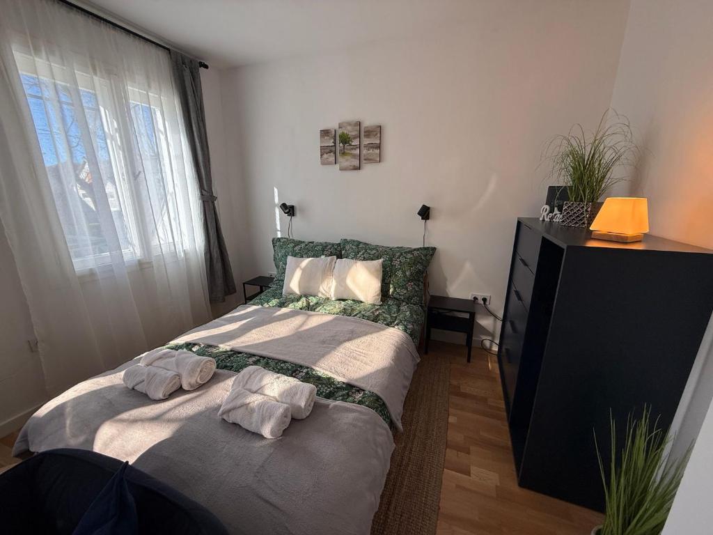 Postel nebo postele na pokoji v ubytování Sparkling Time Apartman